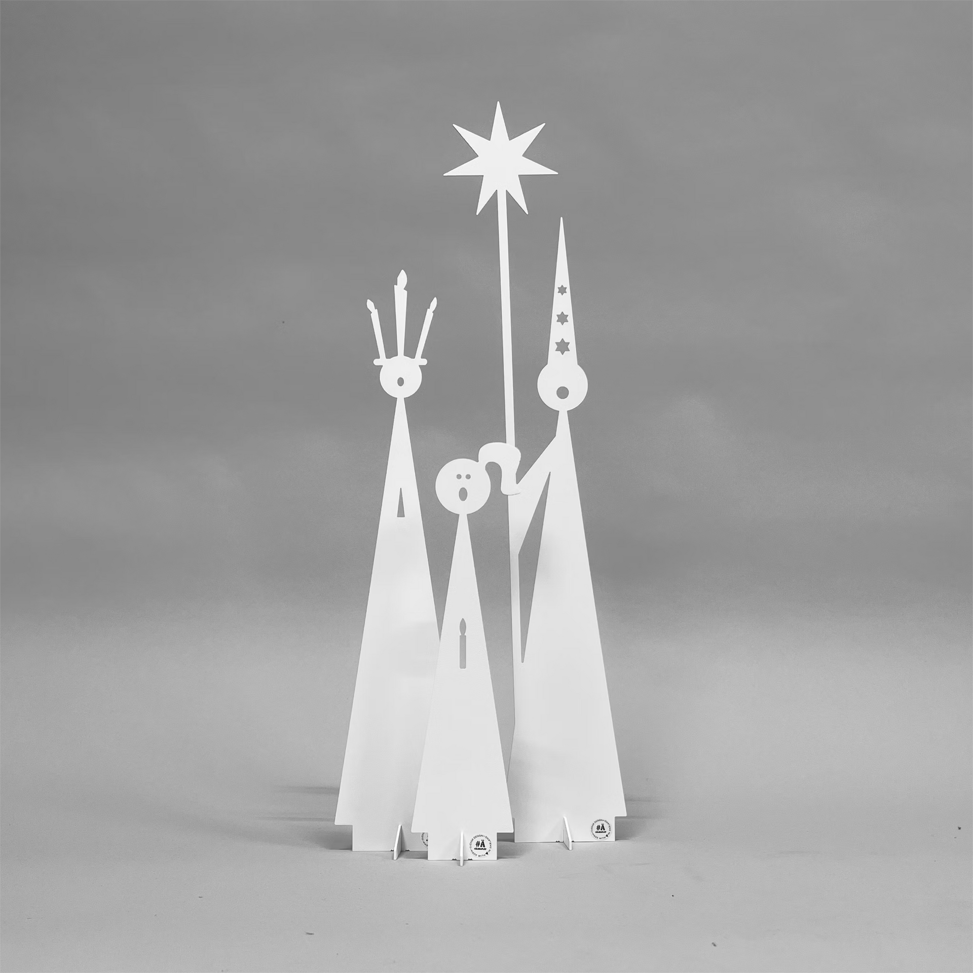 Ein Schwarzweißfoto von Heiligen Drei Königen, die einen Stern halten. Dekoartikel Älskaplat