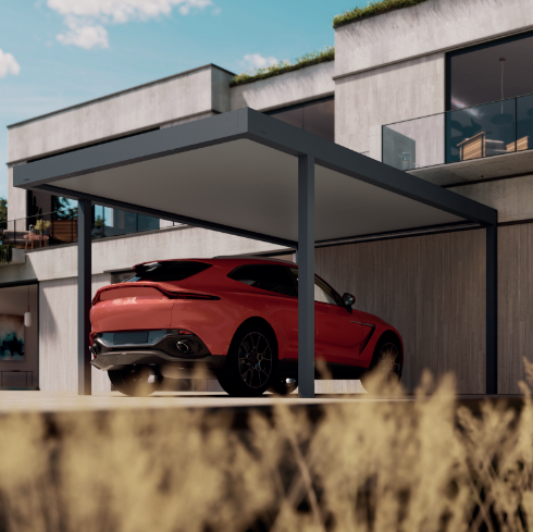 Patio con mesa de comedor, parrilla y techo de vidrio junto al agua, con deck de madera y arboles.