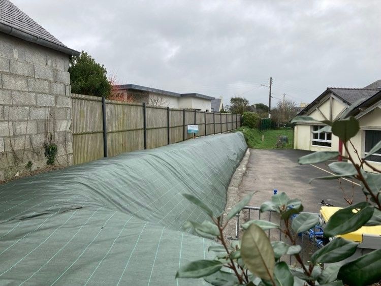 Refection et bachage d'un talus après