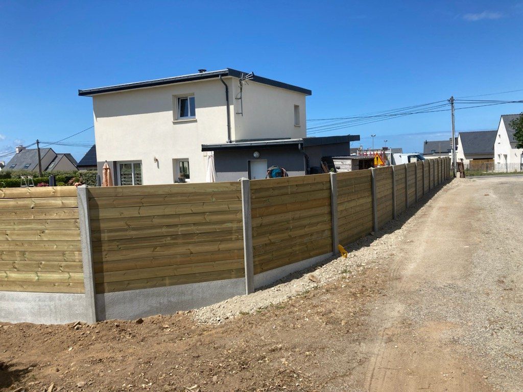 Pose d'une clôture en bois