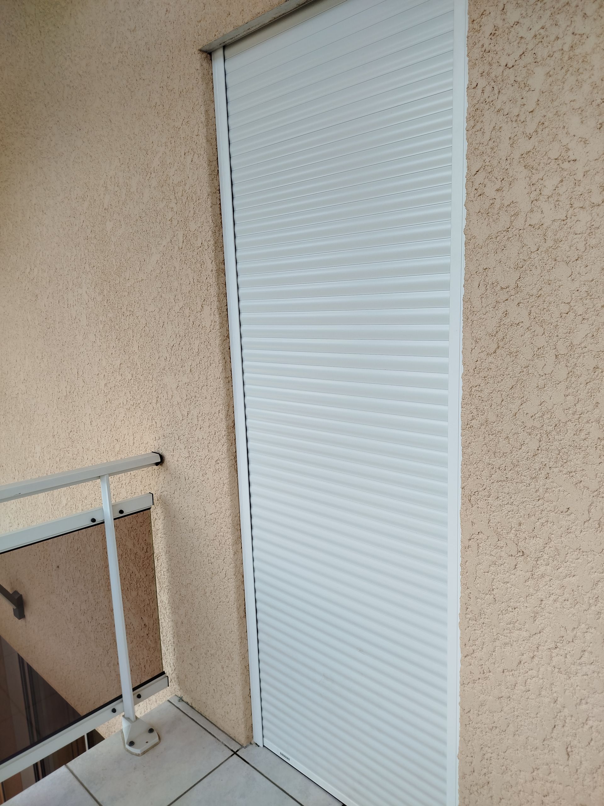 Volet roulant sur porte vitrée