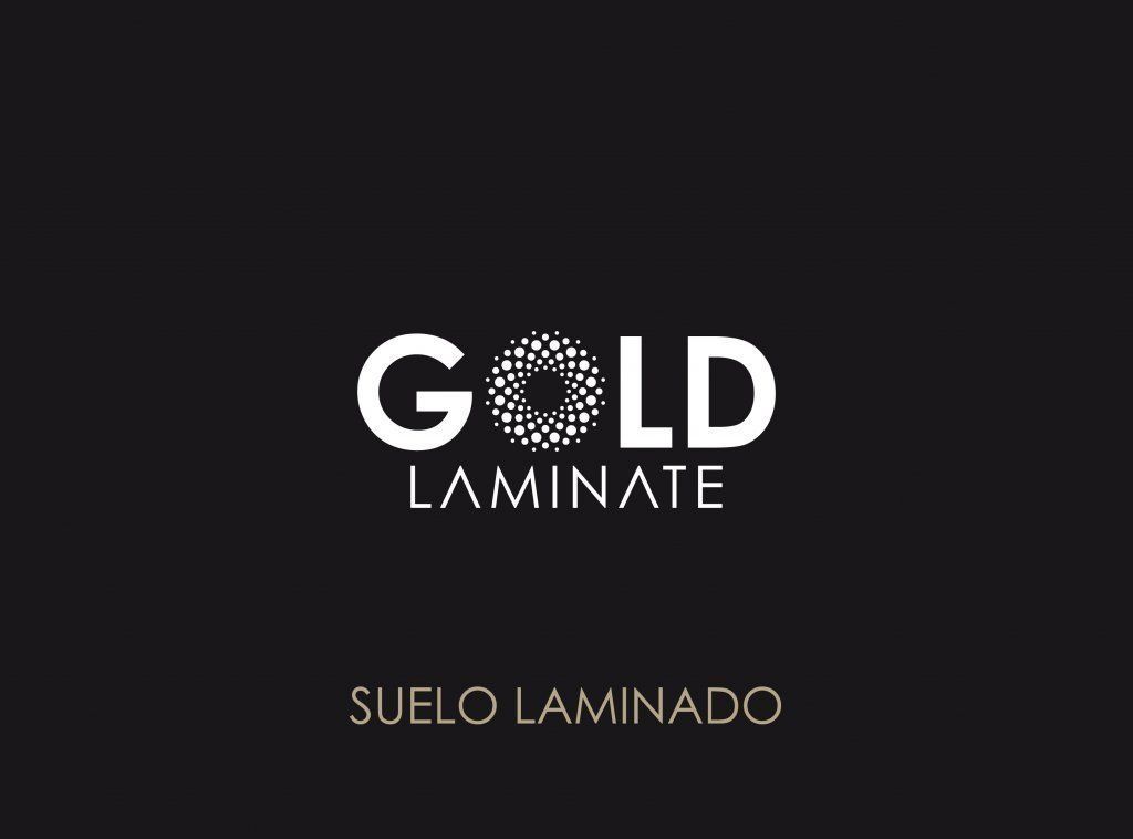 Un logotipo laminado dorado sobre un fondo negro