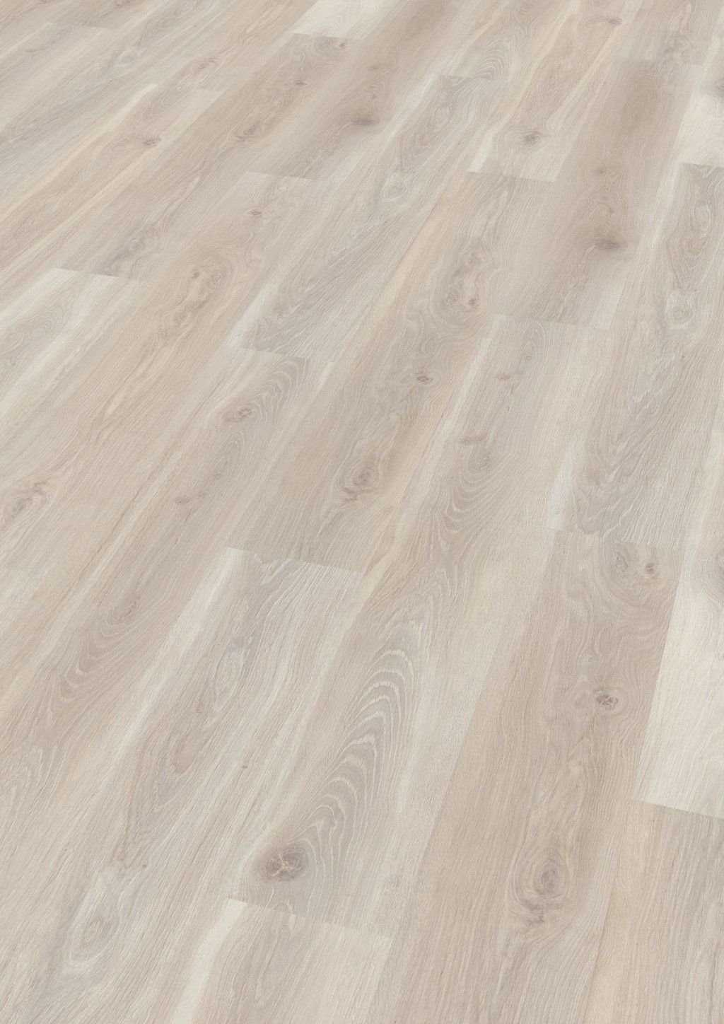 Un primer plano de un piso de madera blanco en una habitación.