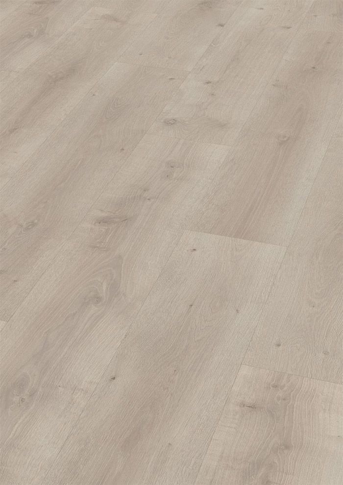 Tablones de piso de madera clara en tonos tostados y beige.