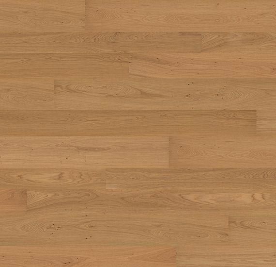 Piso de madera de roble claro, que muestra vetas y nudos de la madera.