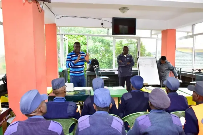 A man is giving a presentation to a group of people