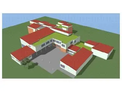 Eine Luftaufnahme eines großen Gebäudes mit roten Dächern und einem grünen Dach.