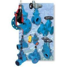 Un montón de válvulas azules están colgadas en una pared.