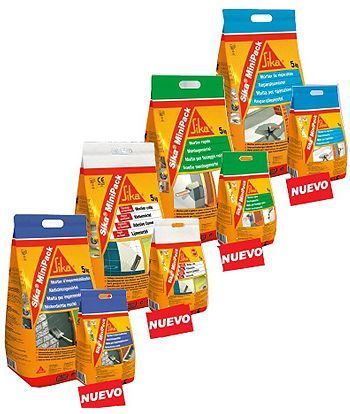 Un montón de bolsas de micropack Sika colocadas una encima de la otra.