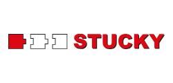 STUCKY-Logo mit roten und weissen geometrischen Blöcken und fetter roter Schrift auf weissem Hintergrund