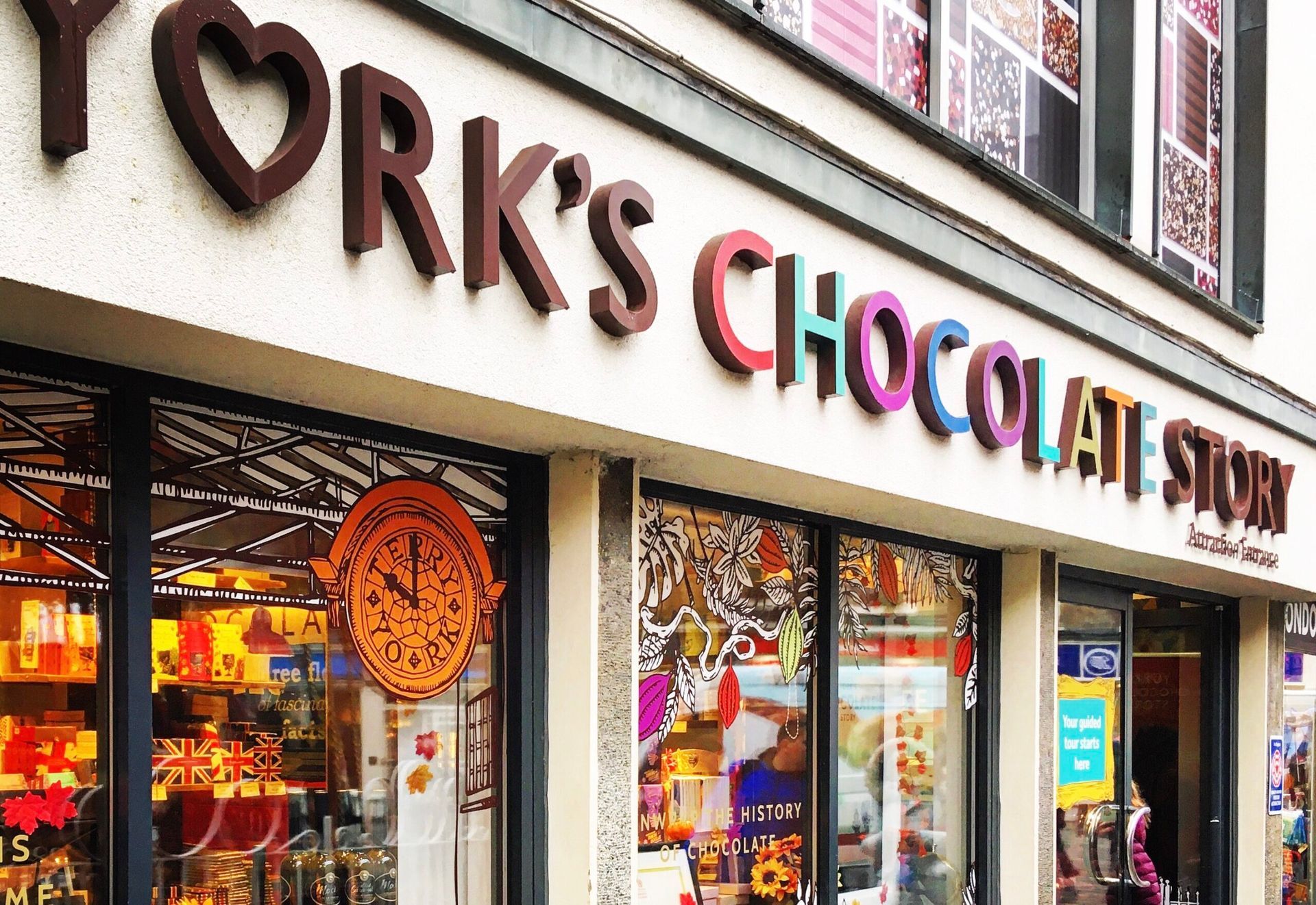 York's Chocolati store exterior with colorful sign and display windows filled with treats.