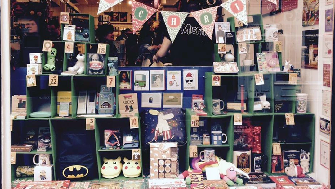A store window with a lot of items on it