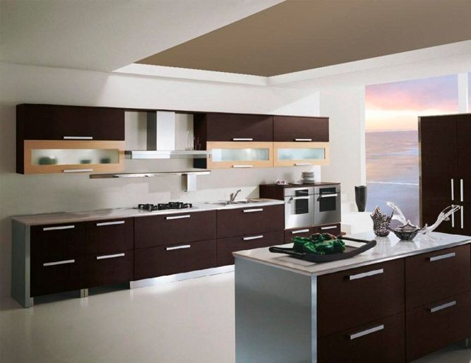 Una cocina con gabinetes marrones y electrodomésticos de acero inoxidable.