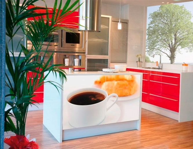 Una cocina con una imagen de una taza de café en el mostrador.