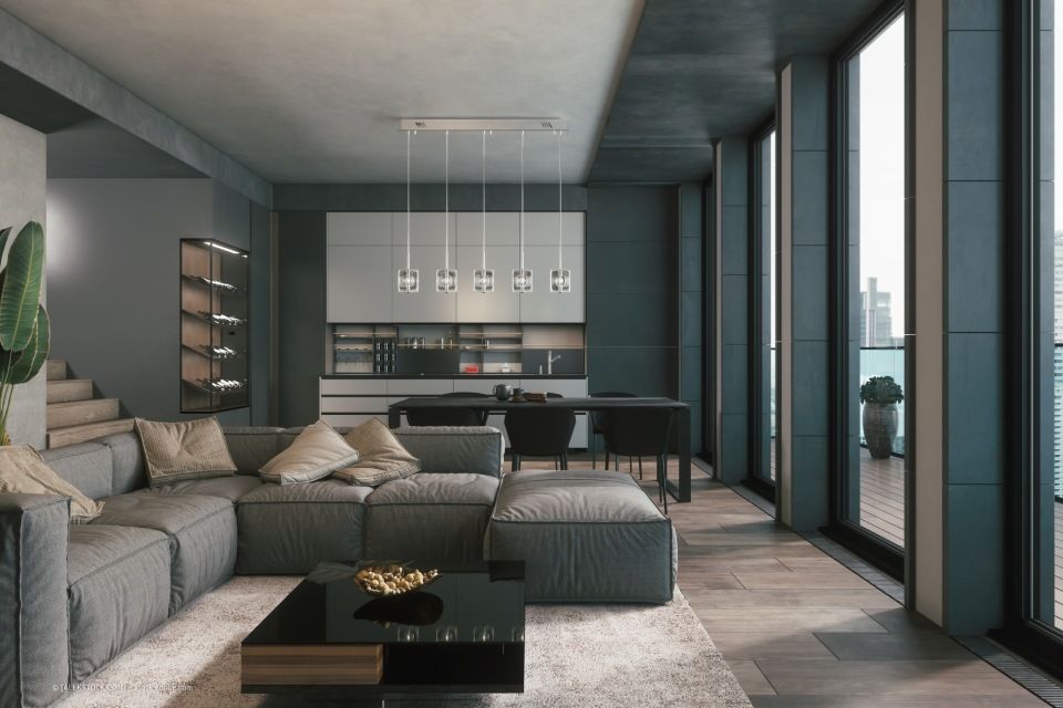 JK Fußbodenbau und Raumausstattung GmbH & Co. KG –  ein edel wirkendes Wohnzimmer mit dunklen Designermöbeln und einem braungrauem Parkettboden