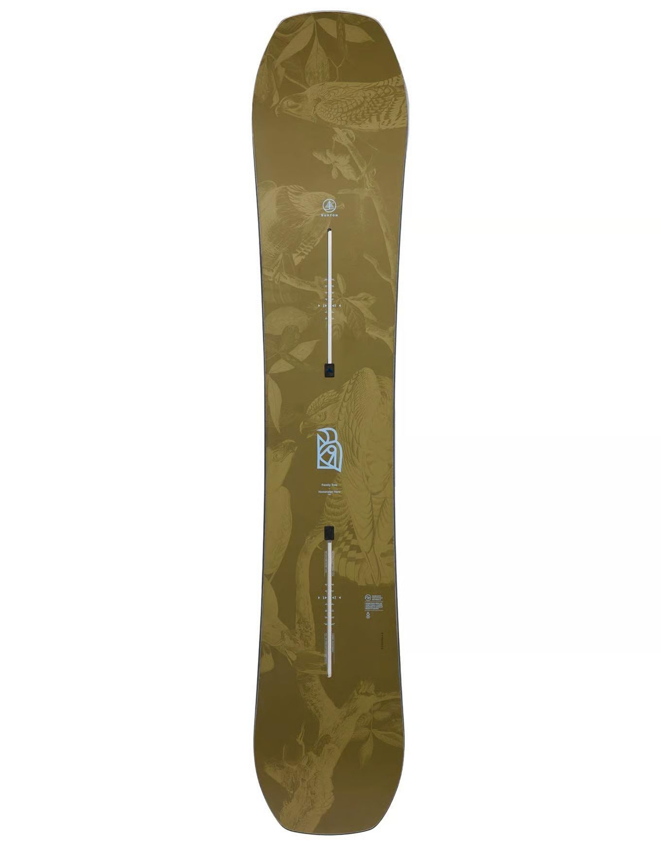 Snowboard beige avec motif floral et inserts de fixation.