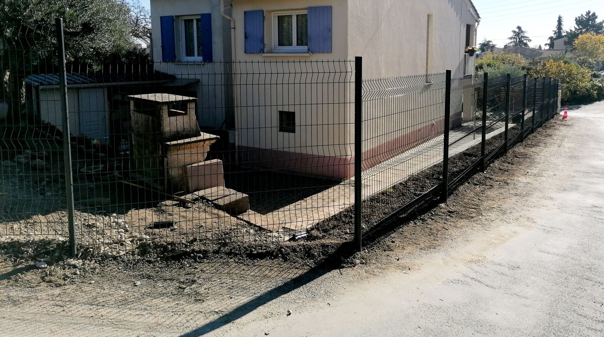 Délimitation de terrain avec une clôture