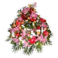 Couronne de fleurs blanche, rouge, rose, orange et verte