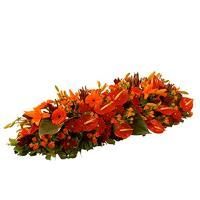 Dessus de cercueil orange et rouge