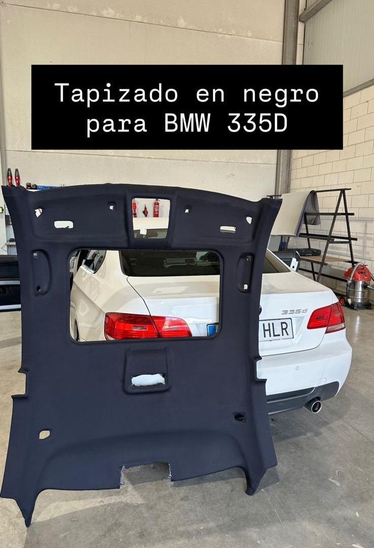 Revestimiento de techo de coche de color negro para BMW 335D, delante de un coche blanco.