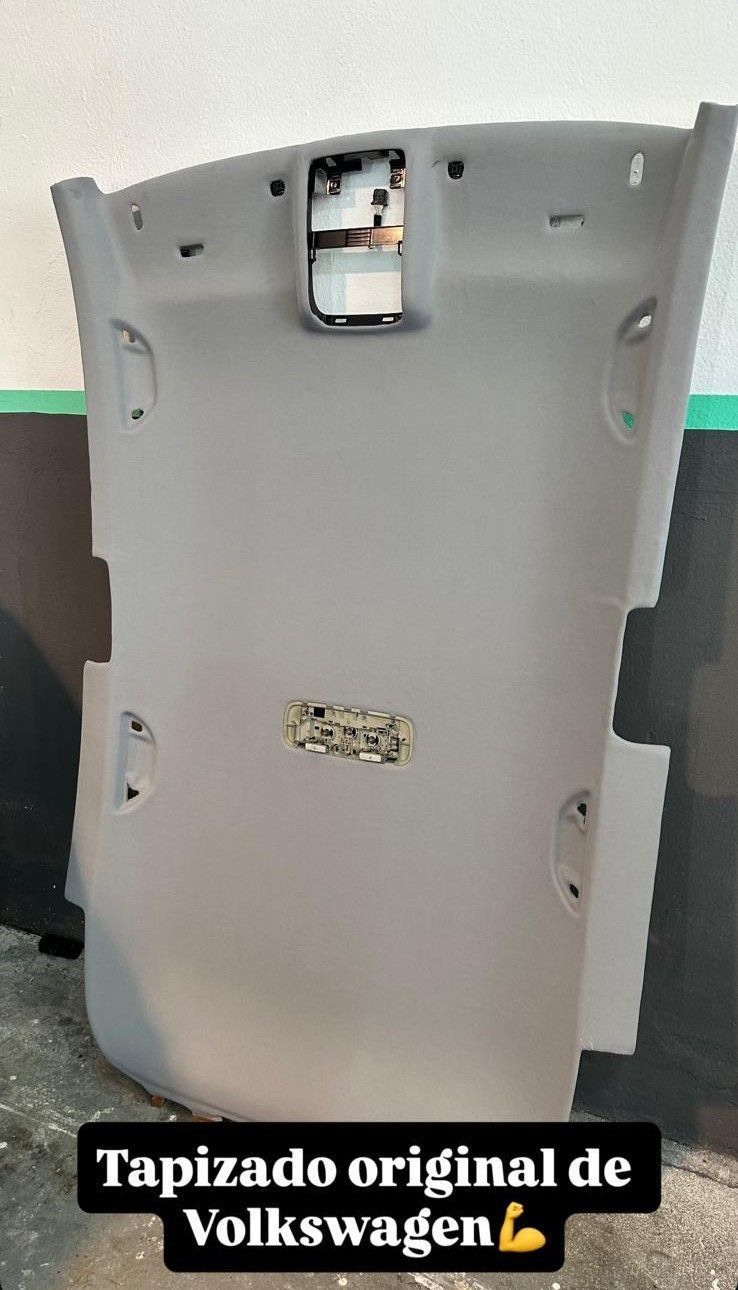 Gray Volkswagen car headliner with text 