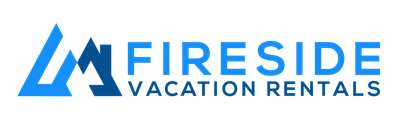 Logo for Fireside Vacation Rentals: blue mountain peaks and text in blue.