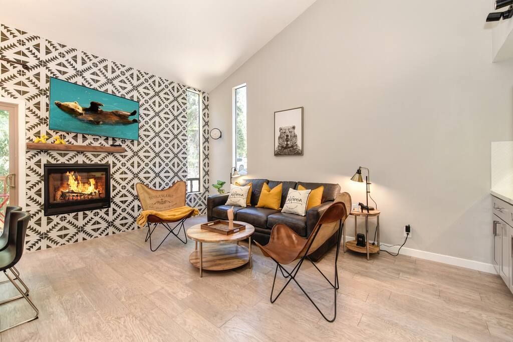 A living room with a fireplace and a couch