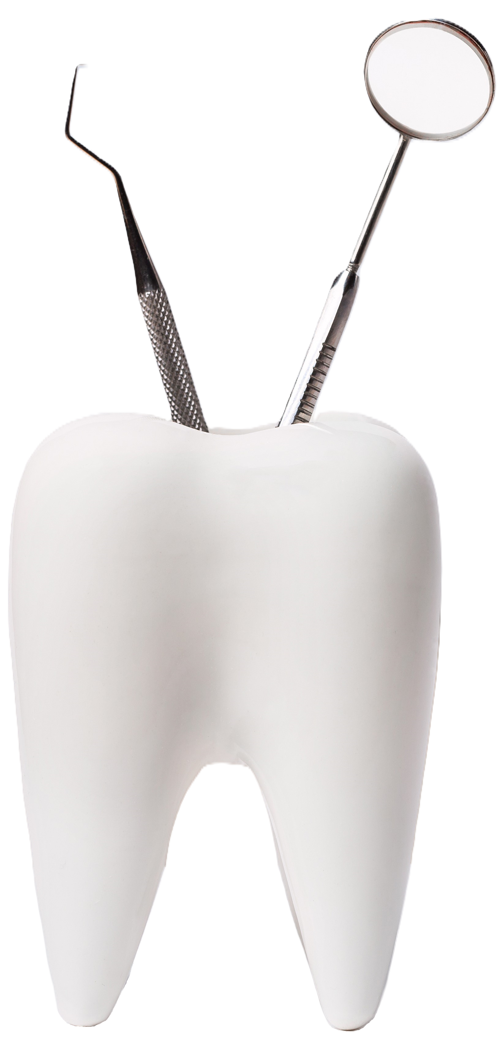 A white tooth with dental tools sticking out of it