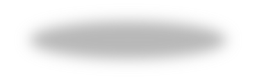 A gray oval shadow on a white background.