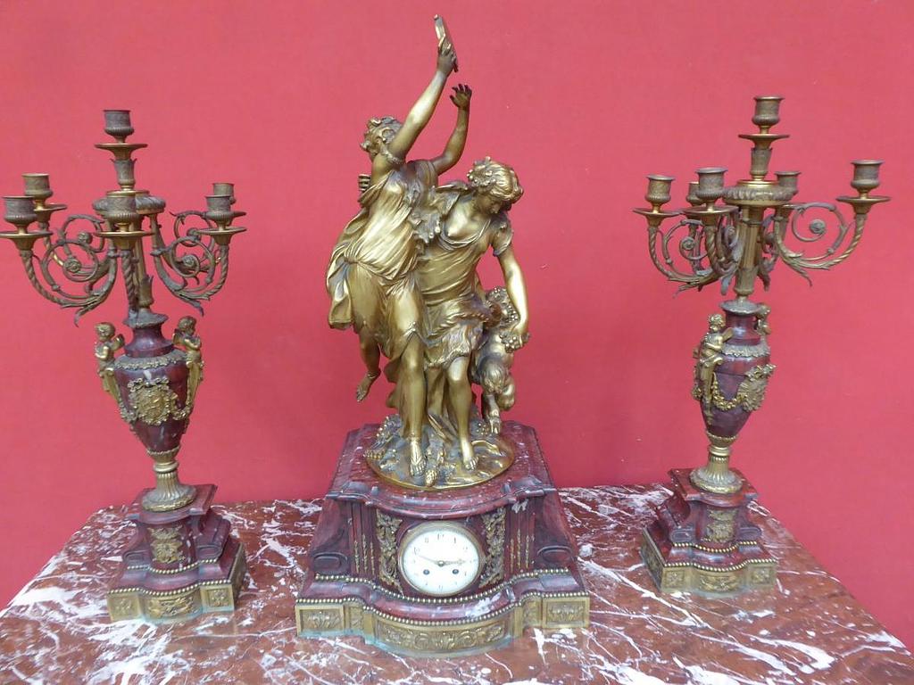 Garniture de pendule bronze doré (adjugée 9 000€)