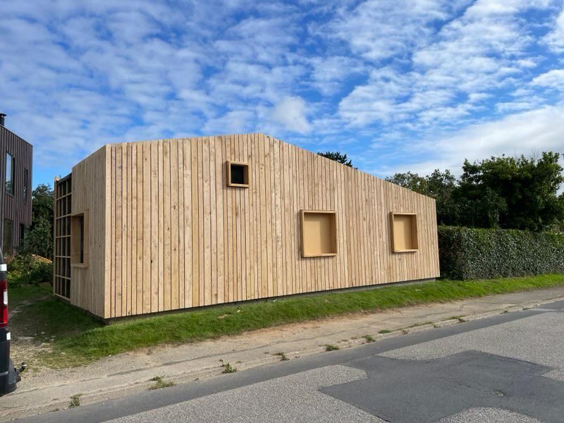 Une maison avec du bardage