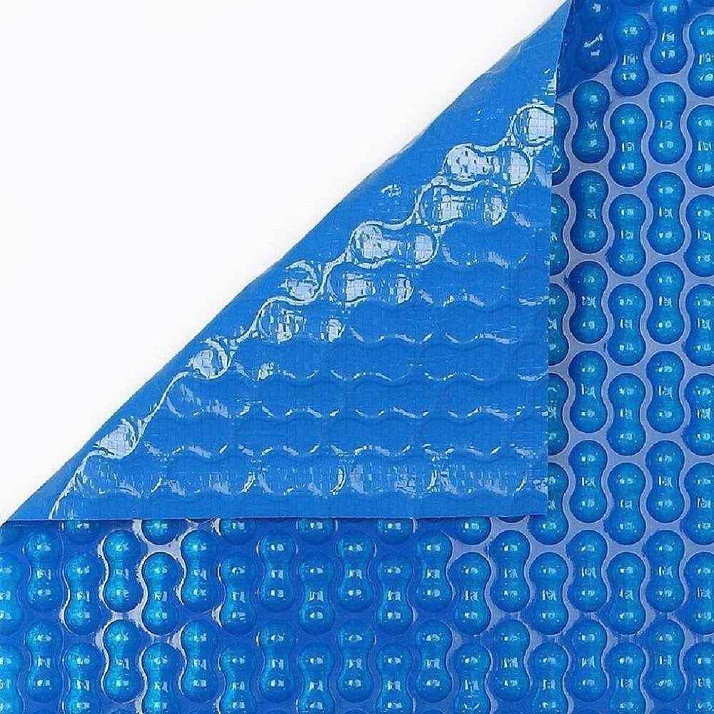 Una cubierta de piscina azul con burbujas.