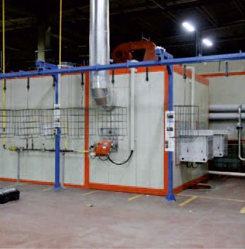 In der Mitte des Raumes steht eine große Maschine.