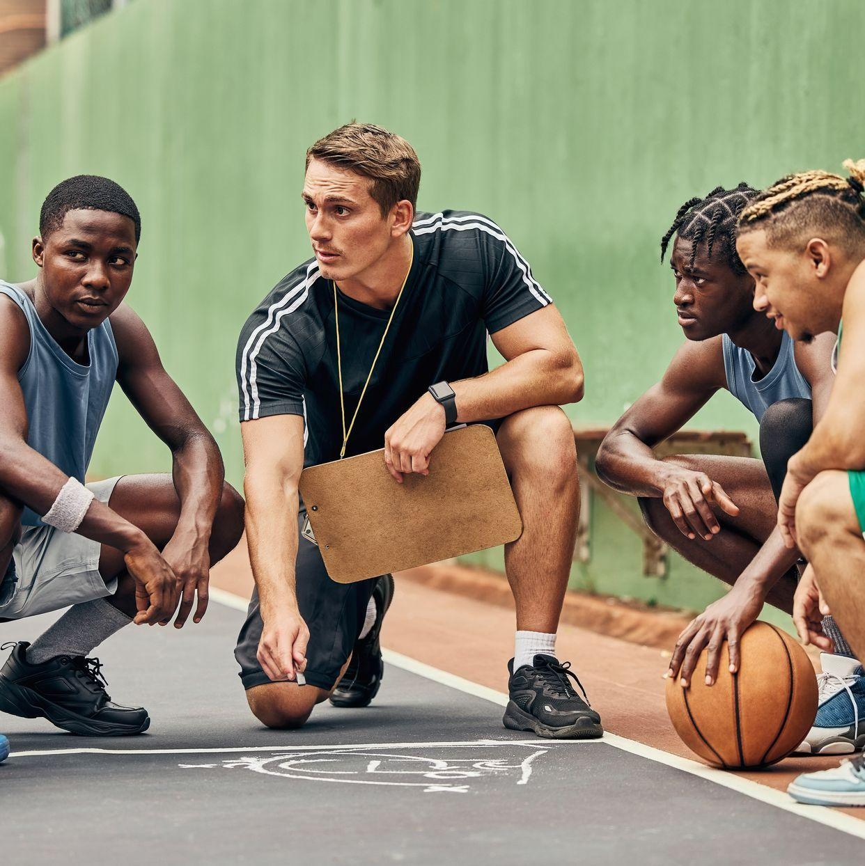 Un coach et son équipe
