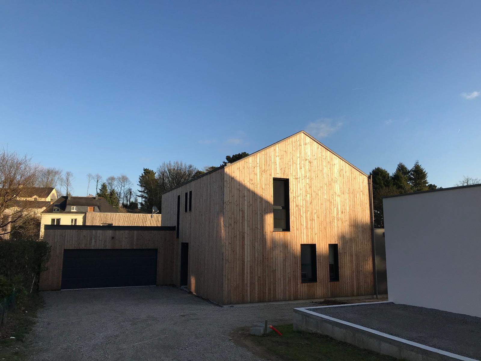 Maison avec garage en ossature bois