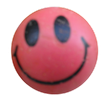 Una bola roja con una cara sonriente.