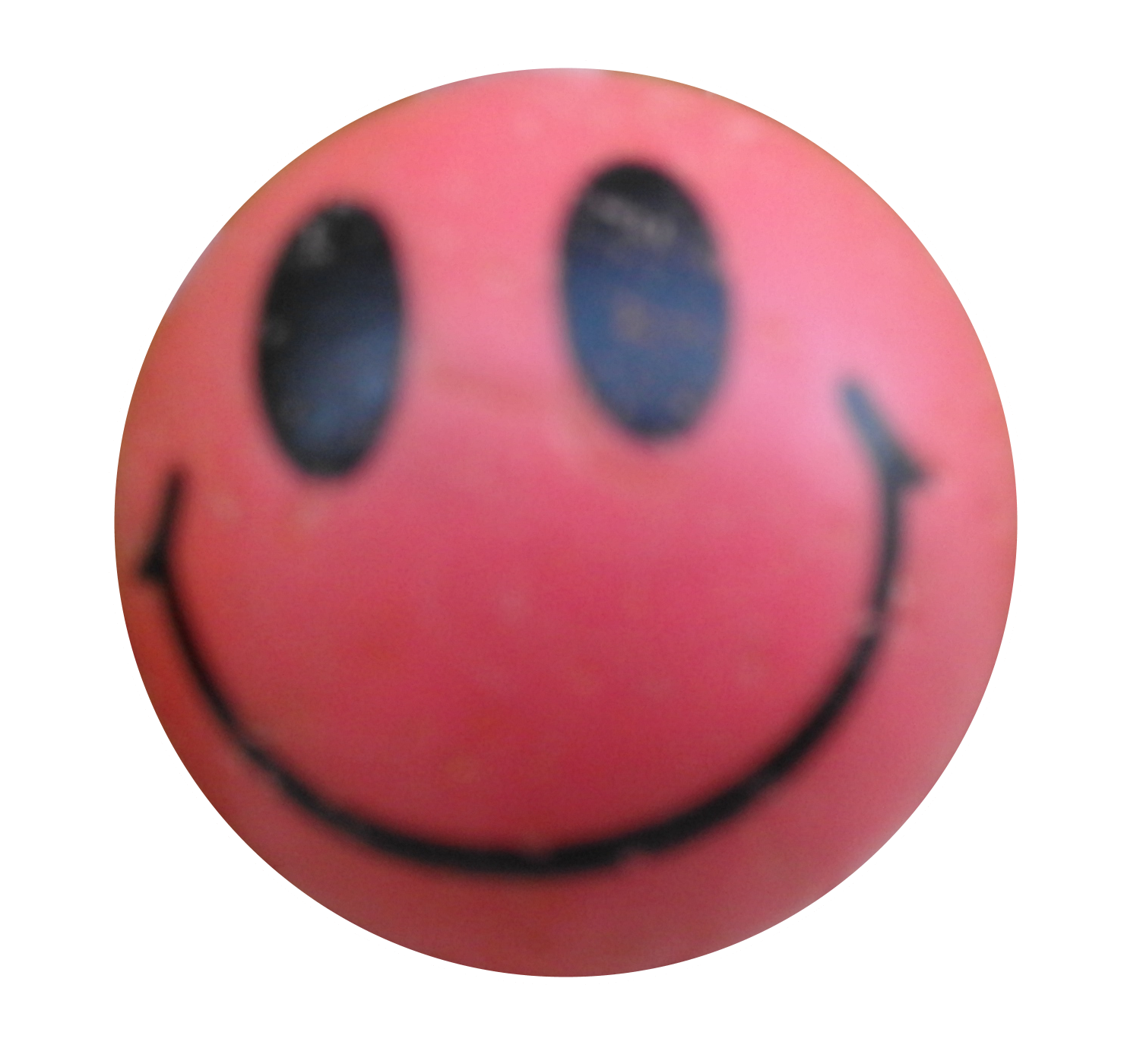 Una bola roja con una cara sonriente.