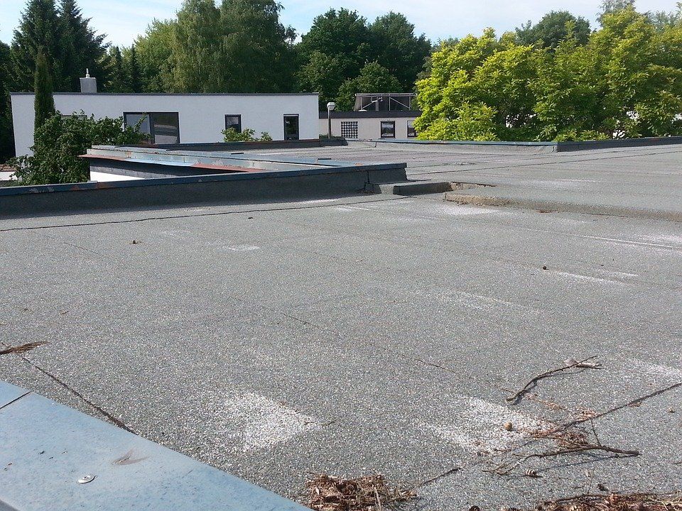 Pose de toit terrasse et bardage