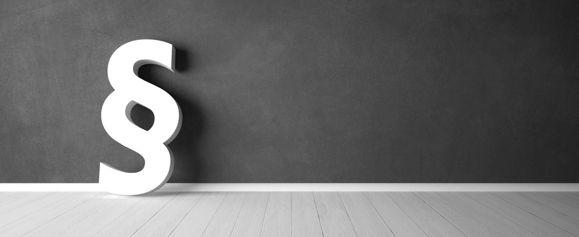 Paragraphenzeichen, angelehnt an eine Wand