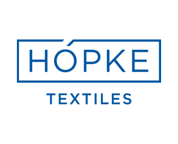 Ein blaues Logo für Hopke Textiles auf weißem Hintergrund
