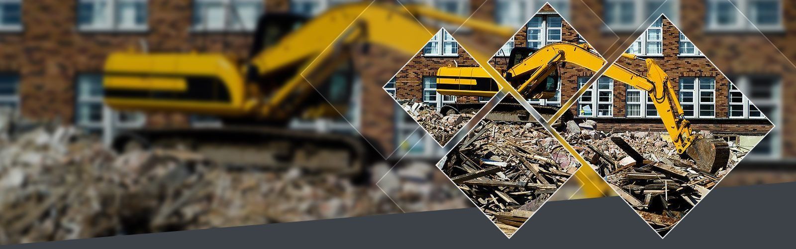 Una excavadora amarilla trabaja en una obra de demolición con escombros frente a un edificio de ladrillo.