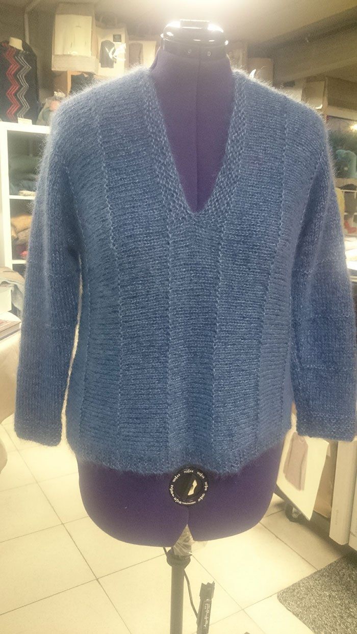 Blauwe gebreide trui