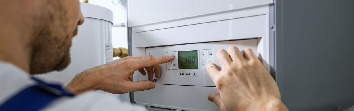 Un système de chauffage et 2 mains.