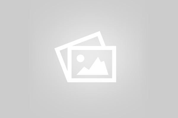 Un icono blanco con una imagen de una montaña sobre un fondo gris.