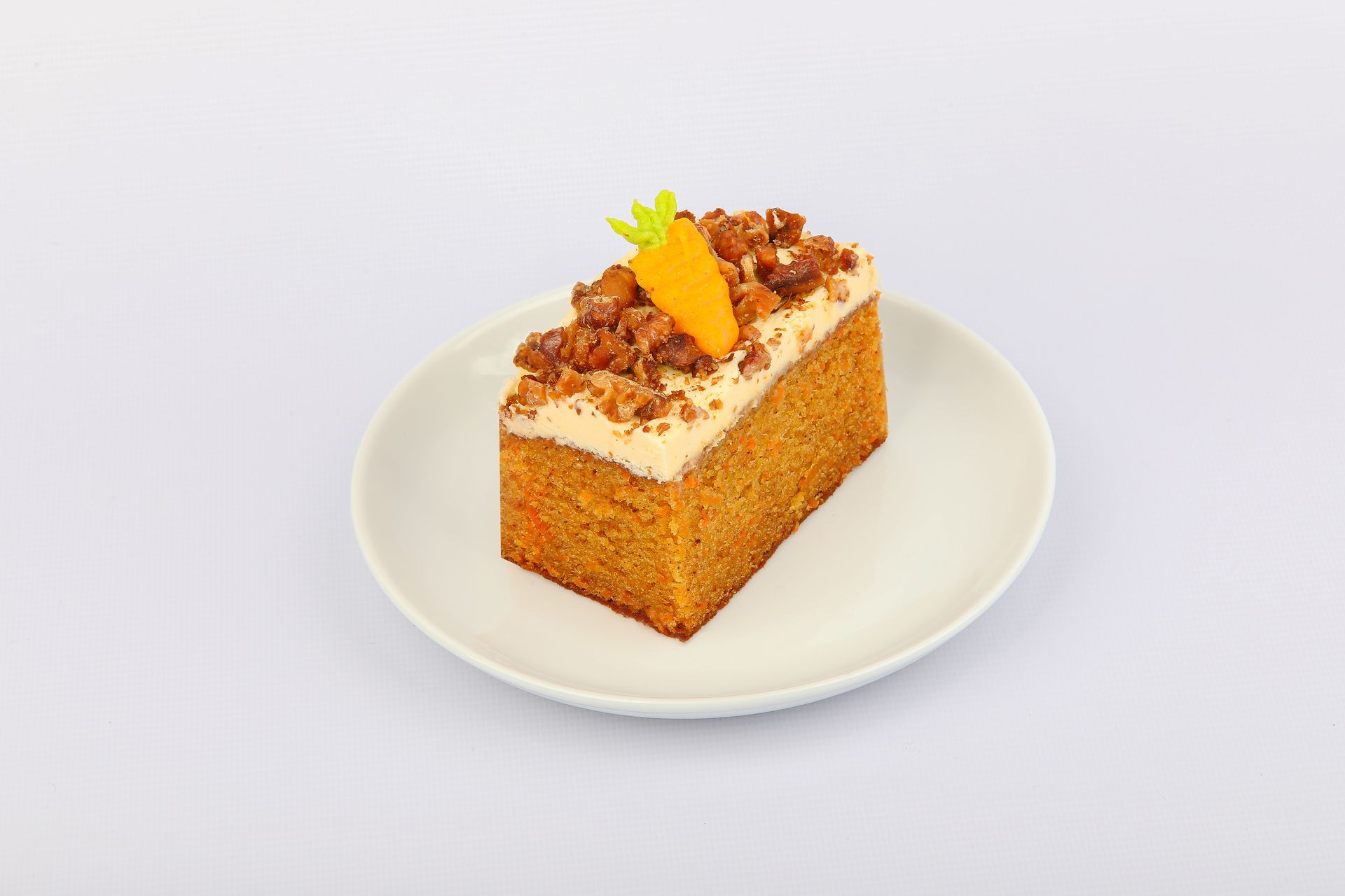 Traditional Moist Spiced Carrot Cake with a Sweet Cream Cheese Frosting Topped with Caramelized Walnut Pieces, Devine !
