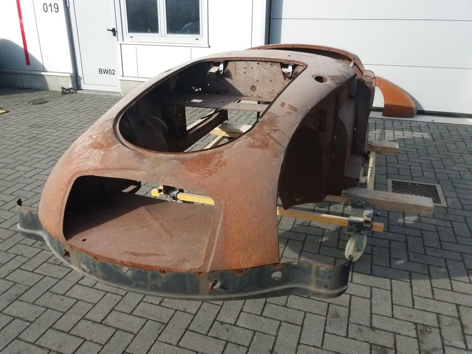 zandstralen auto, luchtgommen auto