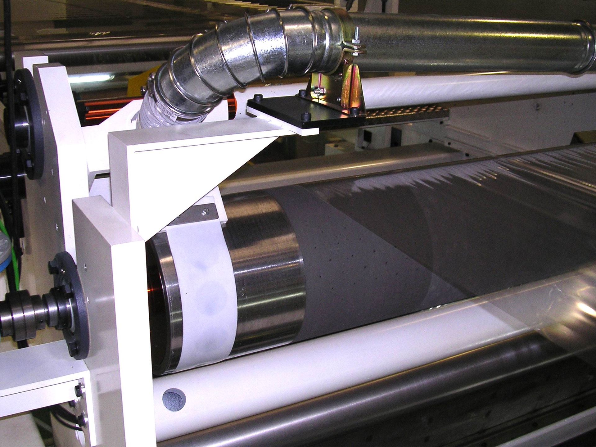 Una máquina de la que sale un tubo.