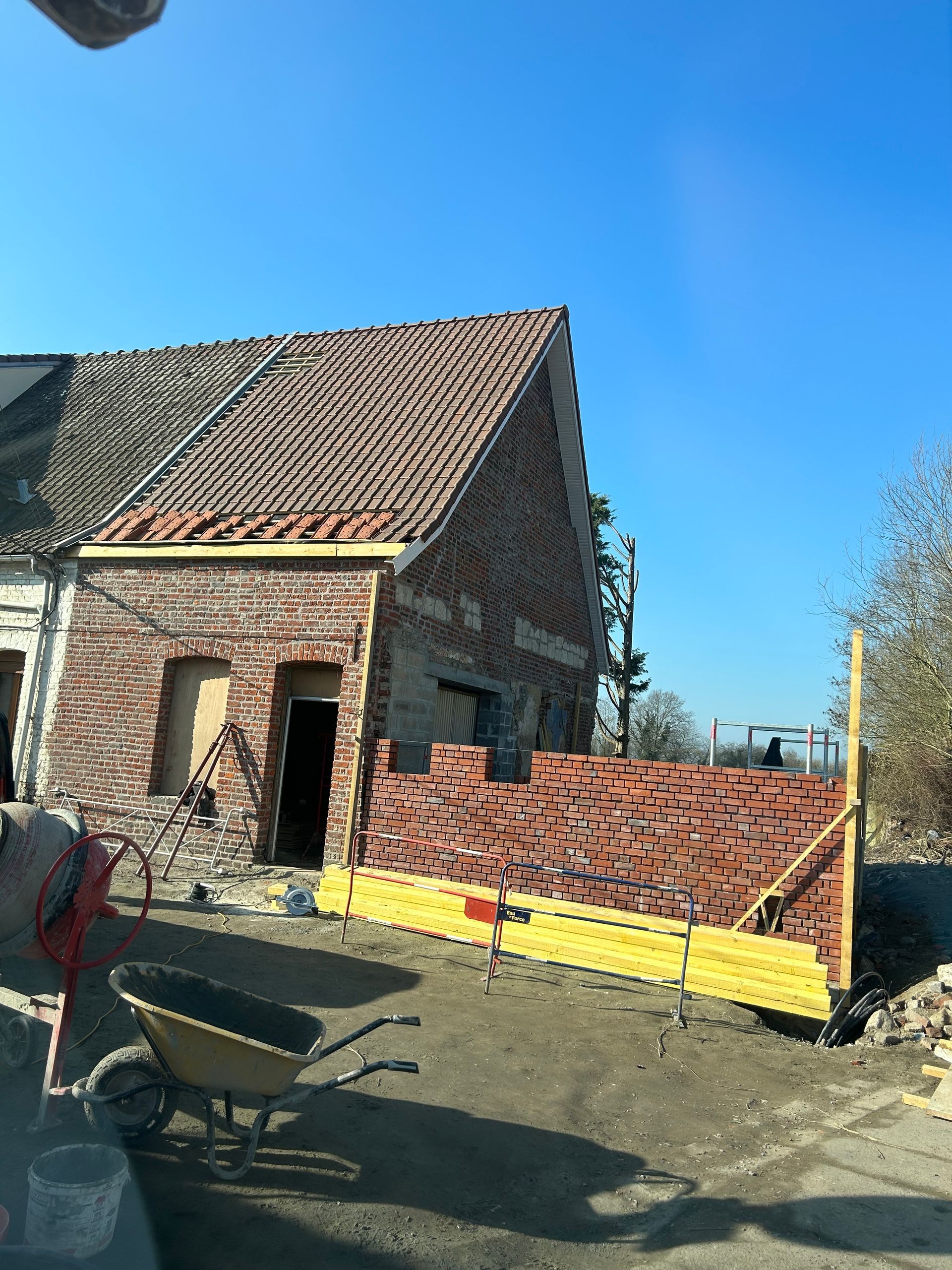 Rénovation d'une maison en brique et création d'une extension