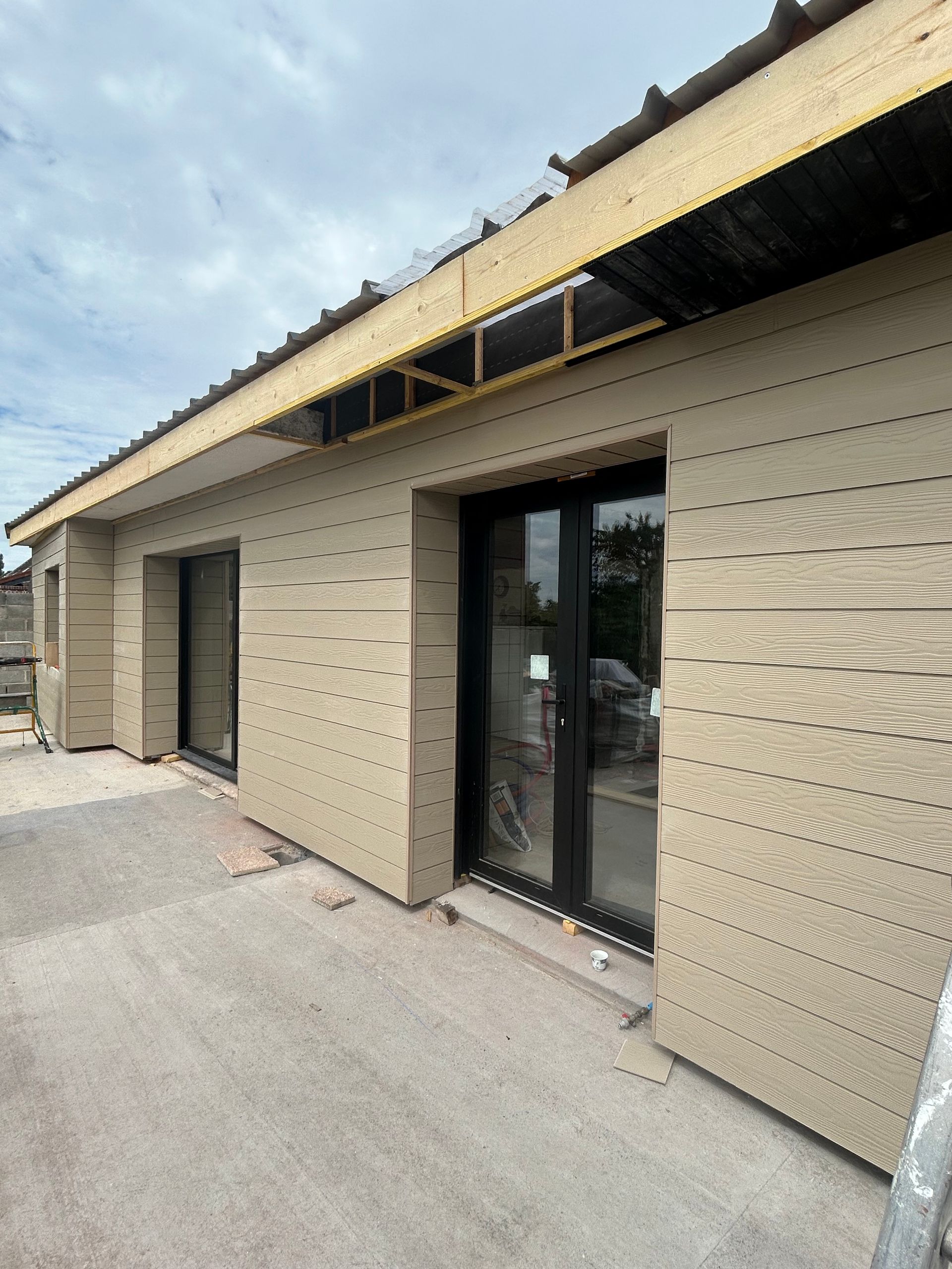 Bardage en Cedral sur une façade