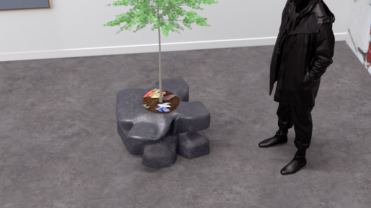 Persona de negro mirando un pequeño árbol en una escultura de roca en el interior.